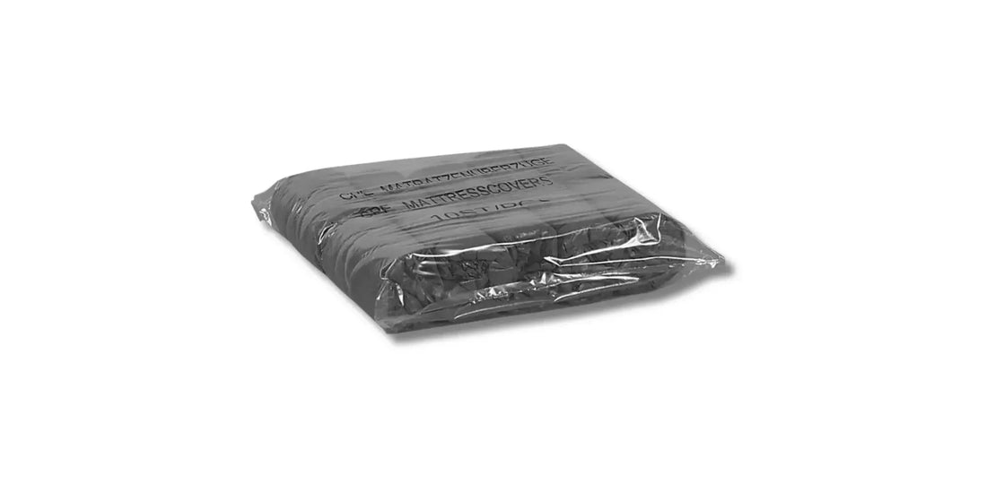 Schwarze plastikverpackung eines matratzenschoners als hygienische einlage ideal für einmalhandschuhe latexhandschuhe nitril einmalhandschuhe