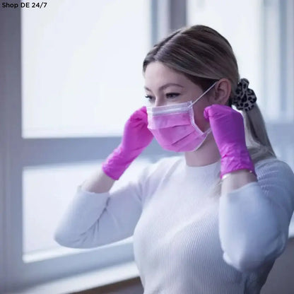 Rosa Einweg-Gesichtsmaske mit weißen elastischen Ohrschlaufen für medizinische Einrichtungen von candy wave beidseitig tragbar