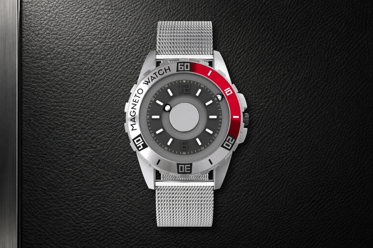 Silberne Magneto Watch Uranus Silver mit roter Lünette und Milanaise-Armband auf schwarzem Leder mit Metallakzent
